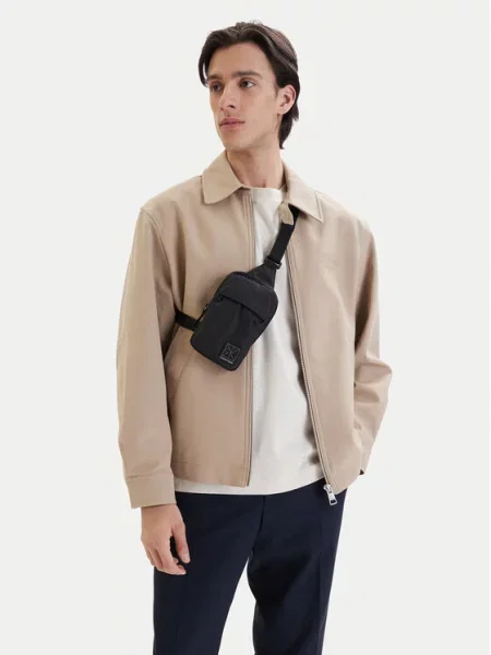 Calvin Klein Torbica za okrog pasu Utility Emblem Phone Crossbody črna