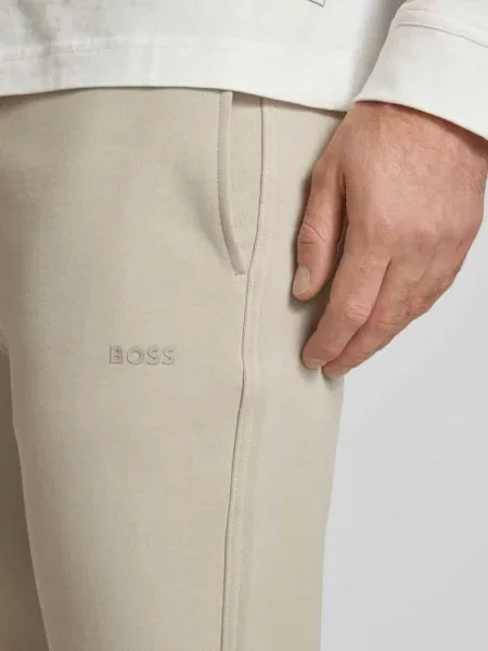 Spodnie dresowe o kroju regular fit z tunelem model ‘SeChup’ Boss Orange beżowe