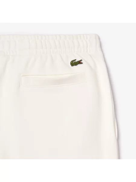 Lacoste Spodnie Dresowe Ze Zwężanymi Nogawkami niebieskie