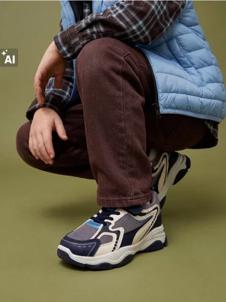 Sinsay Tenisky z imitace kůže a síťovinou Jiné