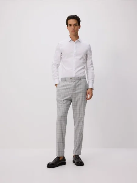 Reserved Pantaloni de costum cu adăugată deschis gri