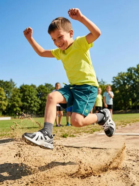Sinsay Sportovní kraťasy s reflexními prvky Active zelená