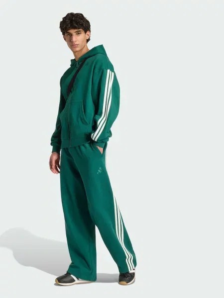 Повседневные брюки Adidas в полоску зеленые