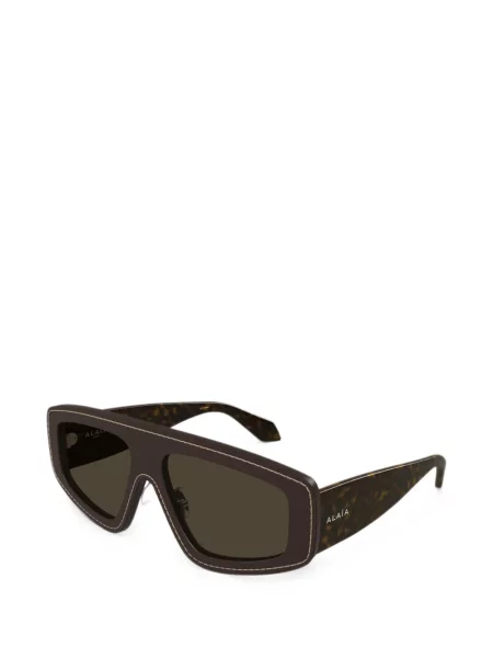 Saulės akiniai Alaia Eyewear ruda