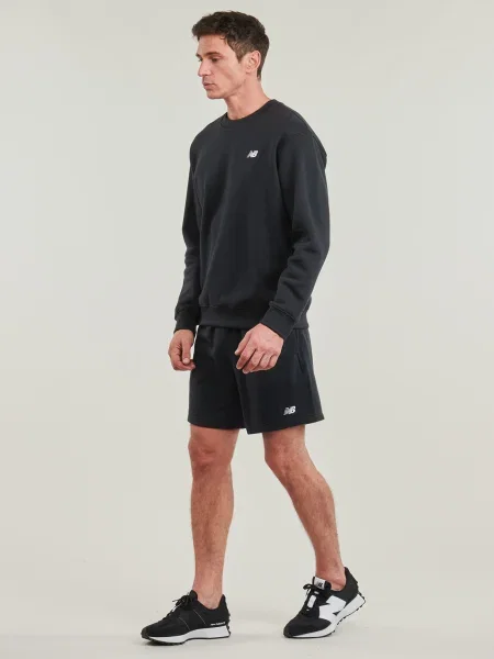 Pantaloni New Balance scurte din material terry negru