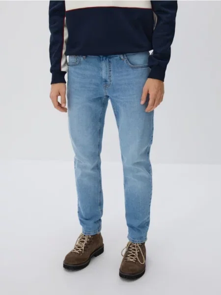 Reserved Jeansy slim z efektem sprania niebieski