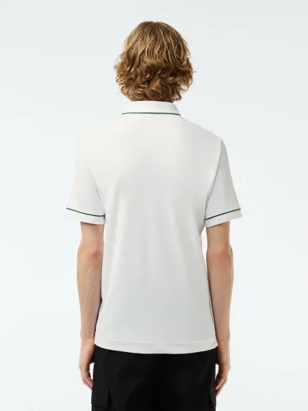 Поло Lacoste белое