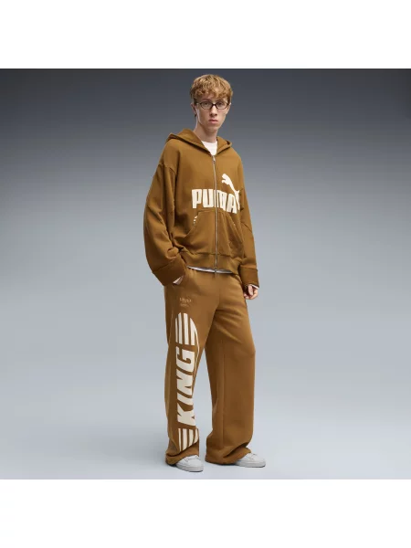PUMA spodnie dresowe KING o kroju oversize Odzież S brązowy