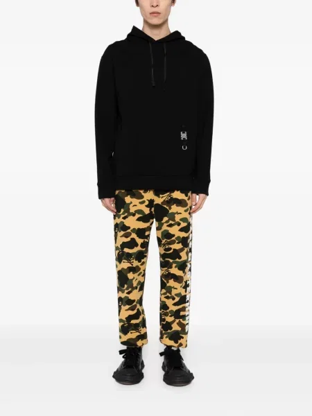 Pantaloni Mastermind Japan cu imagine maro