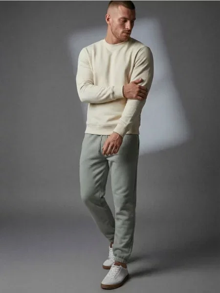 Sinsay Spodnie dresowe jogger zielony