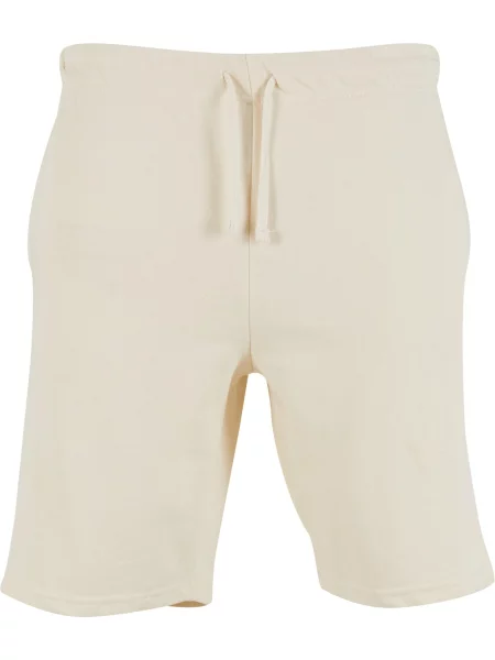 Urban Classics Kalhoty Terry pastelově oranžová