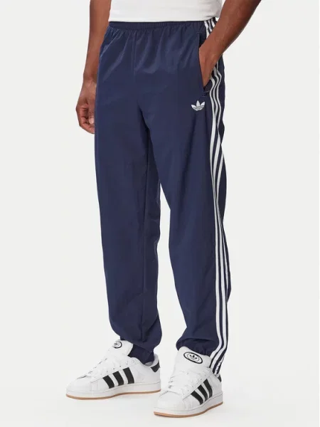 Adidas Sportinės kelnės Firebird Woven Tamsiai mėlyna
