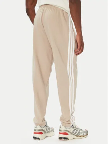 Adidas Spodnji del trenirke Essentials French Terry Tapered Cuffed Bež bela