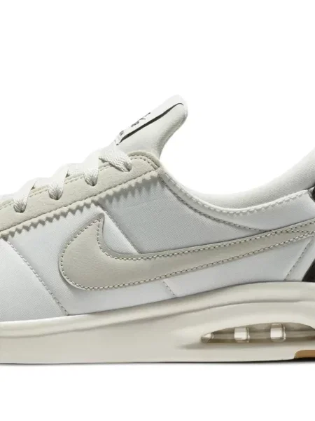 Talia legginsy Nike w kratkę z nadrukiem fioletowe