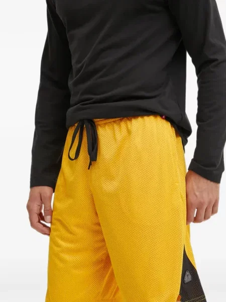 Pantaloni scurți Reebok plasă galben
