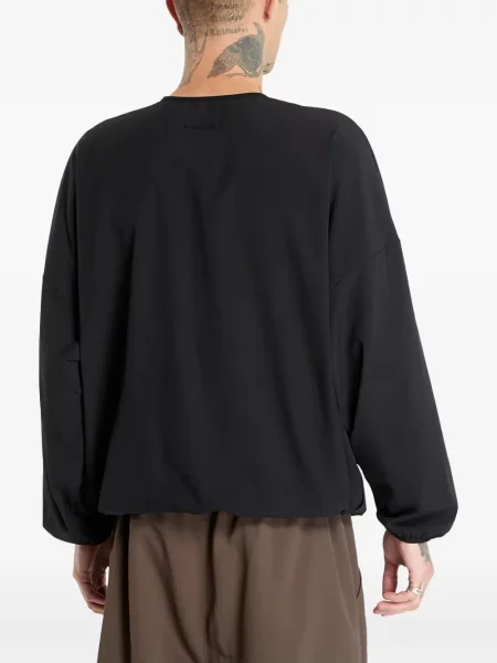 Pantaloni palazzo Adidas cu dungi cu decolteu în V negru