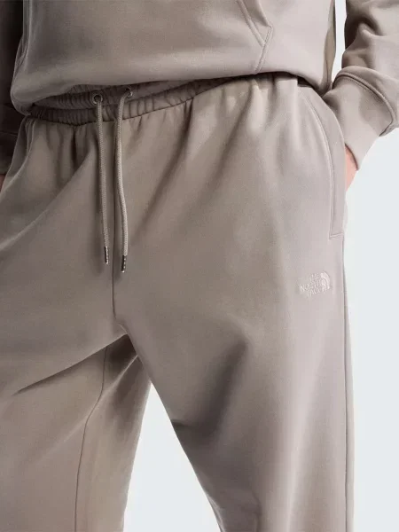 Повсякденні штани The North Face M TNF ESSENTIAL TERRY SIMPLE D бавовна/поліестер сірий