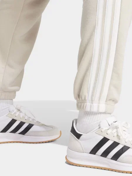 Спортивні штани adidas ESSENTIALS FRENCH TE бавовна/поліамід бежевий