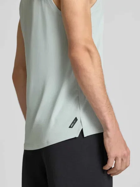 T-shirt sportowy o kroju regular fit z nadrukiem z logo model PWRMODE' Puma Performance miętowa