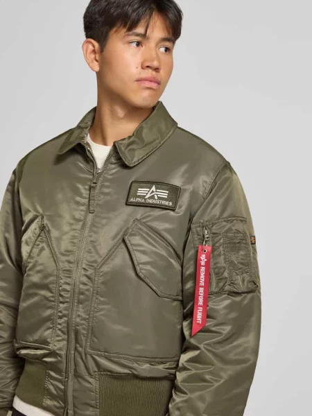 Bomberka z bocznymi z patką i naszywką z logo Alpha Industries oliwkowy