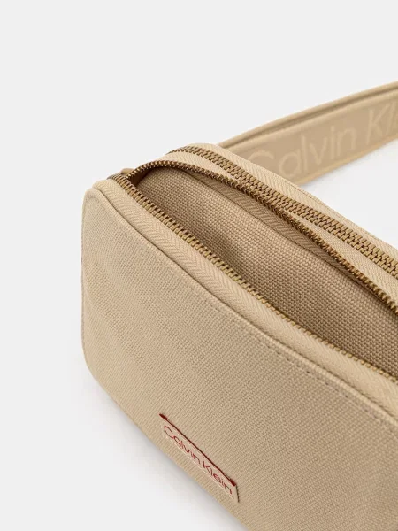 Calvin Klein Táska Webbing Strap Canvas Camera Bag bézs