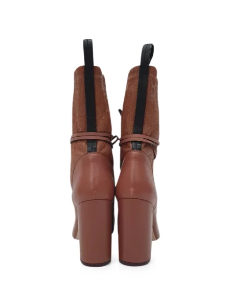 Gležnjače Stuart Weitzman s vezicama s čipkom smeđa