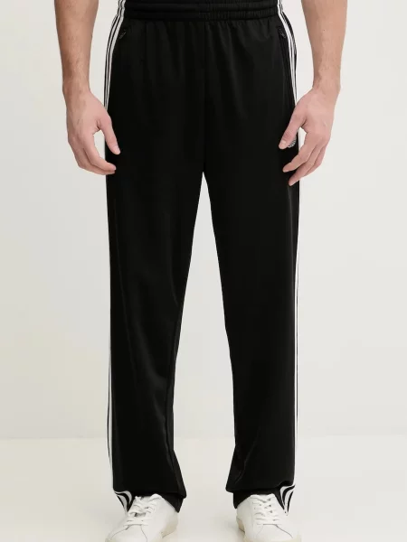 Спортивні штани adidas Originals Firebird з аплікацією чорний