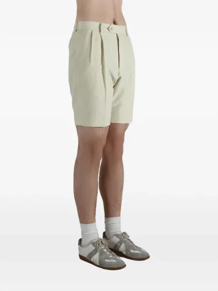 Pantaloni chino Auralee plisate