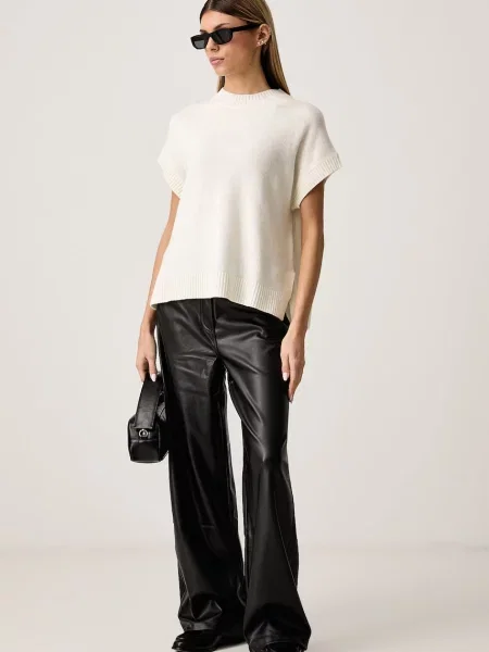 Calvin Klein Jeans nohavice wide leg dámske z imitácie kože čierna