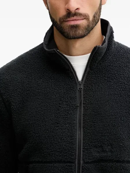 Geacă Jack Wolfskin din fleece negru