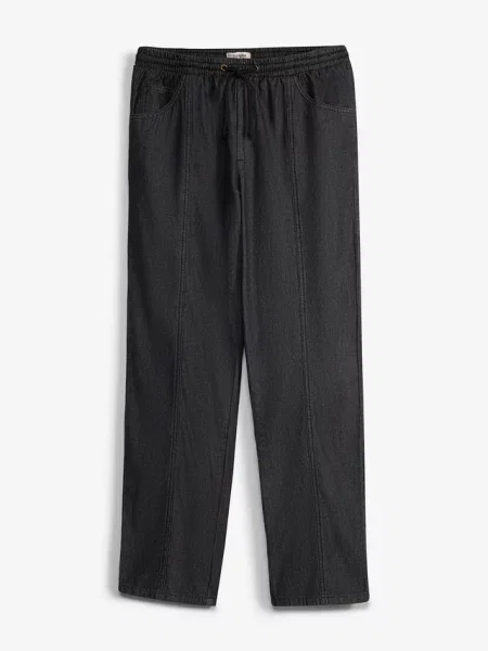 Lekkie spodnie z gumką w talii o kroju loose fit prosta nogawka czarne
