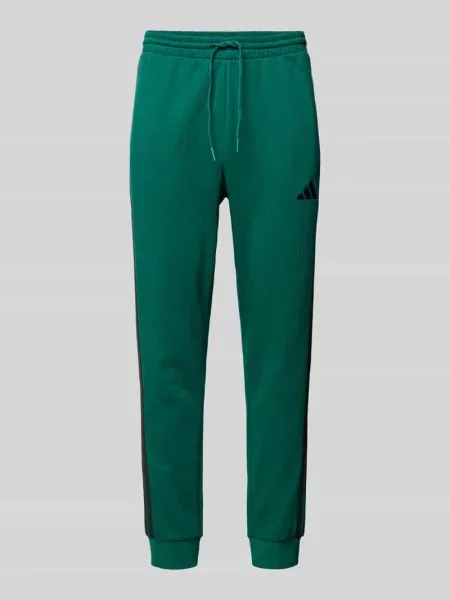 Spodnie dresowe z elastycznym pasem Adidas Sportswear zielony