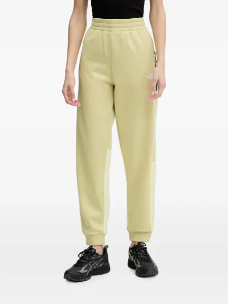 Pantaloni The North Face din fleece alergare verde
