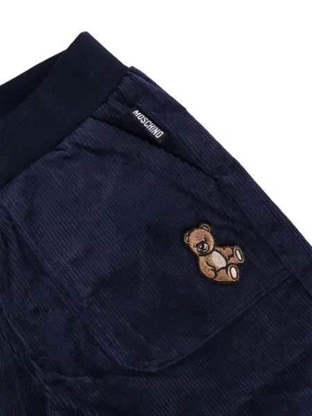 Spodnie dziecięce Moschino niebieskie