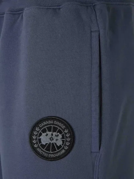 Futó nadrág Canada Goose autogrammal kék