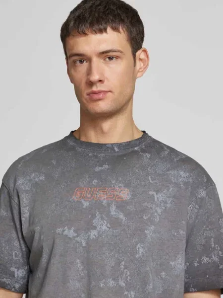 T-shirt z nadrukiem z logo model ‘MUSCARI’ Guess Activewear czarna