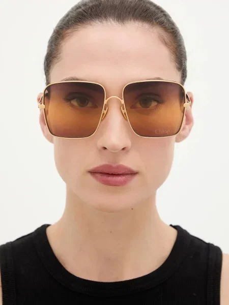 Солнцезащитные очки Chloé золотые