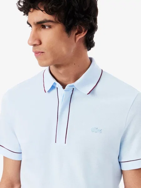 Поло Lacoste голубое