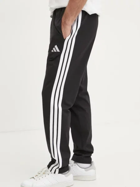 Adidas melegítőnadrág Essentials nyomott mintás fekete