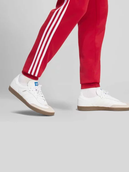 Spodnie dresowe o kroju slim fit z domieszką bawełny Adidas Originals