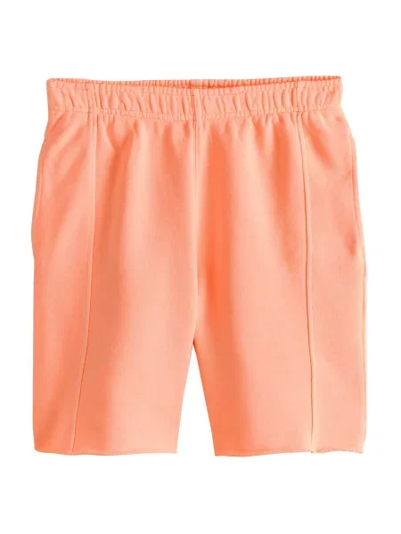 Next Kalhoty pastelově oranžová