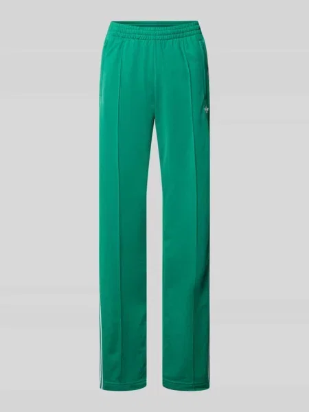 Spodnie dresowe o kroju regular fit z detalem z logo Model FB CLASSIC TP Klasyka Adidas Originals zielony