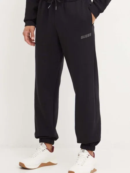 Tepláky Guess EMIS s potiskem černá