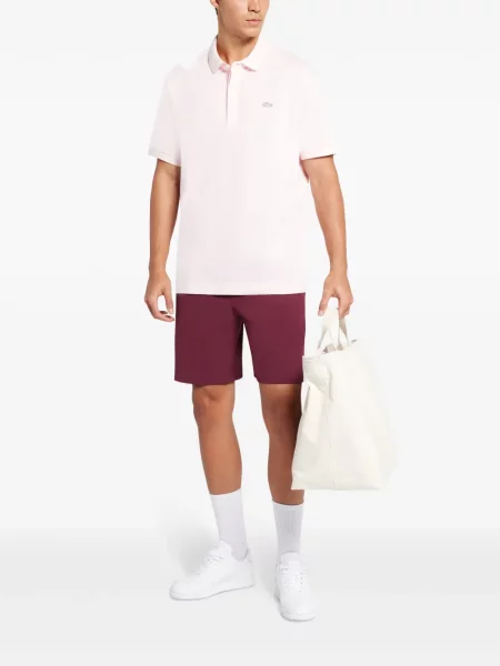 Trumpas polo marškinėliai Lacoste su aplikacija rožinė
