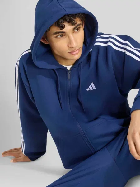 Bluza rozpinana o kroju regular fit z mieszanki bawełny Adidas Sportswear granatowa