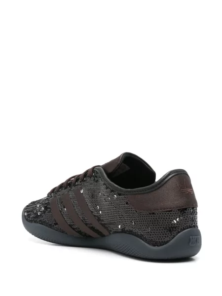 Spodnie Adidas z nadrukiem w panterkę brązowe