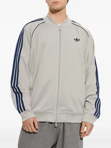 Vestă Adidas alergare cu dungi tricotate albastru