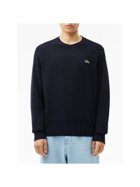 Bluza Lacoste wełniana z długim rękawem niebieska