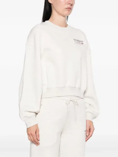 Decupat pantaloni New Balance cu imagine alergare