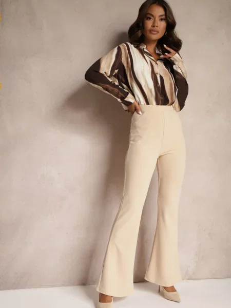 Pantaloni evazați cu în talie Breylina bej